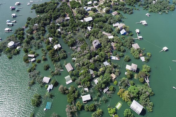 flooded neighborhood of houses and trees