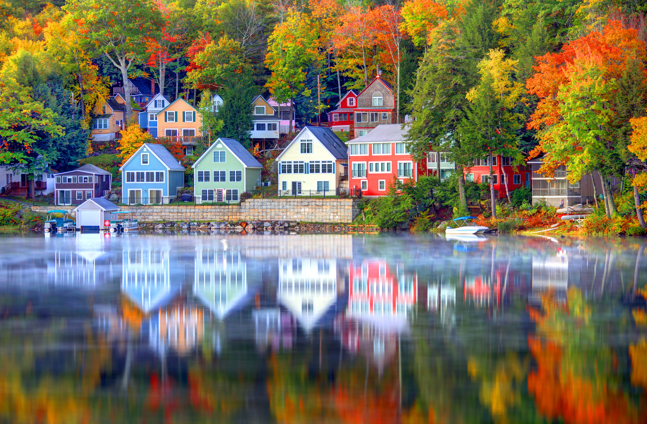 A neighborhood of homes along a lake.