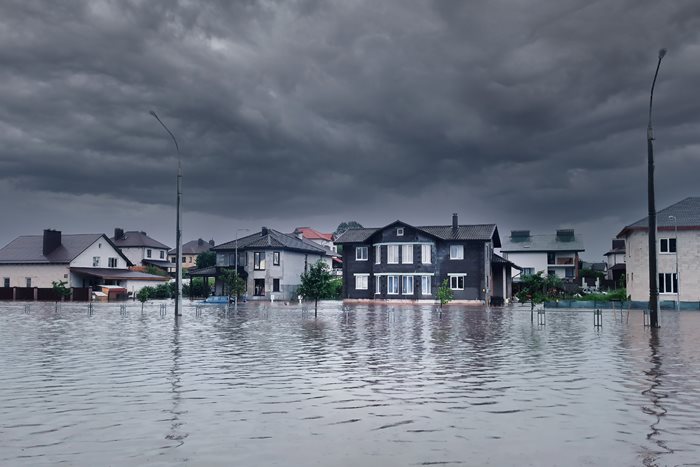 Luxury homes and streets flooding after a hurricane