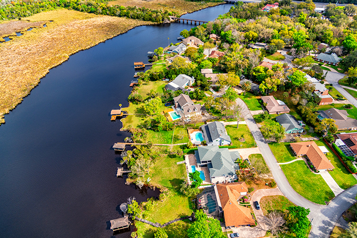 An affluent suburban housing development near the water.