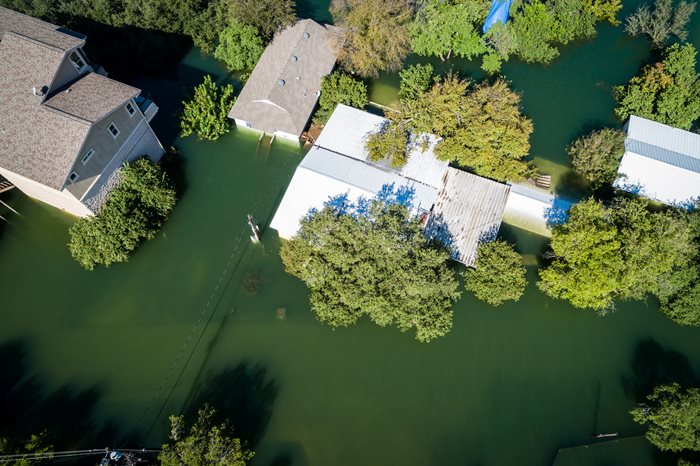 aerial view of luxury homes flooding.