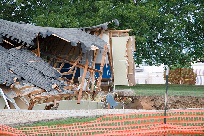 A house collapsed into a sinkhole.